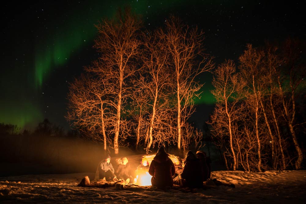 campfire at northern lights